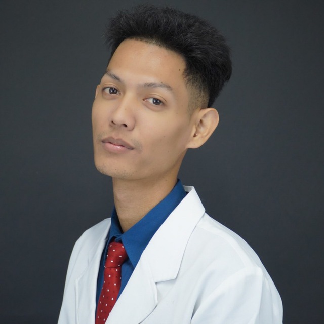 Dr. Roth fitting custom dental jewelry and grillz in Phnom Penh Cambodia